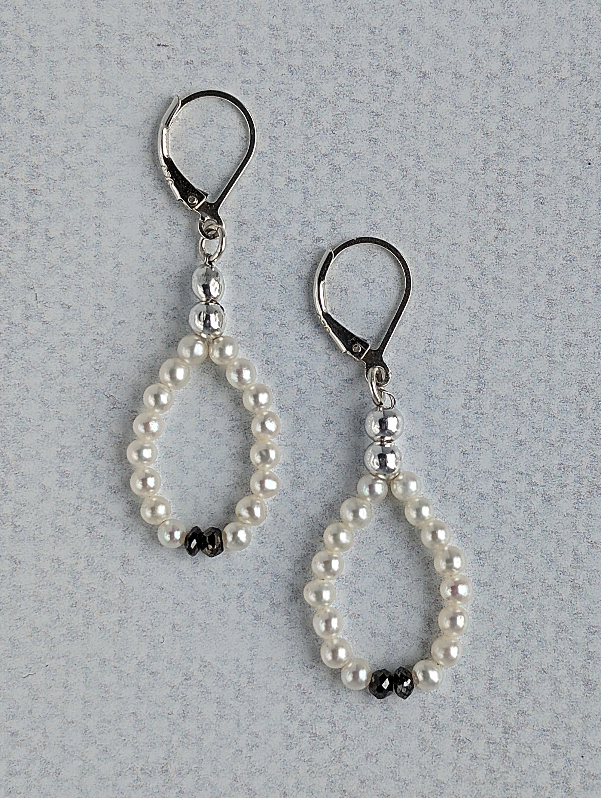 Champagne and Caviar Earrings - White Pearls and Black Diamonds