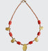 Showing the whole Gold and coral necklace with gold toggle clasp. There are five oval, tearshaped gold gilded textured tektite stones. The center stone is larger than the others. Inbetween are six dark orange barrel shaped and oval shaped coral beads with small gold glass beads inbetween and tapering to the clasp measuring 18".