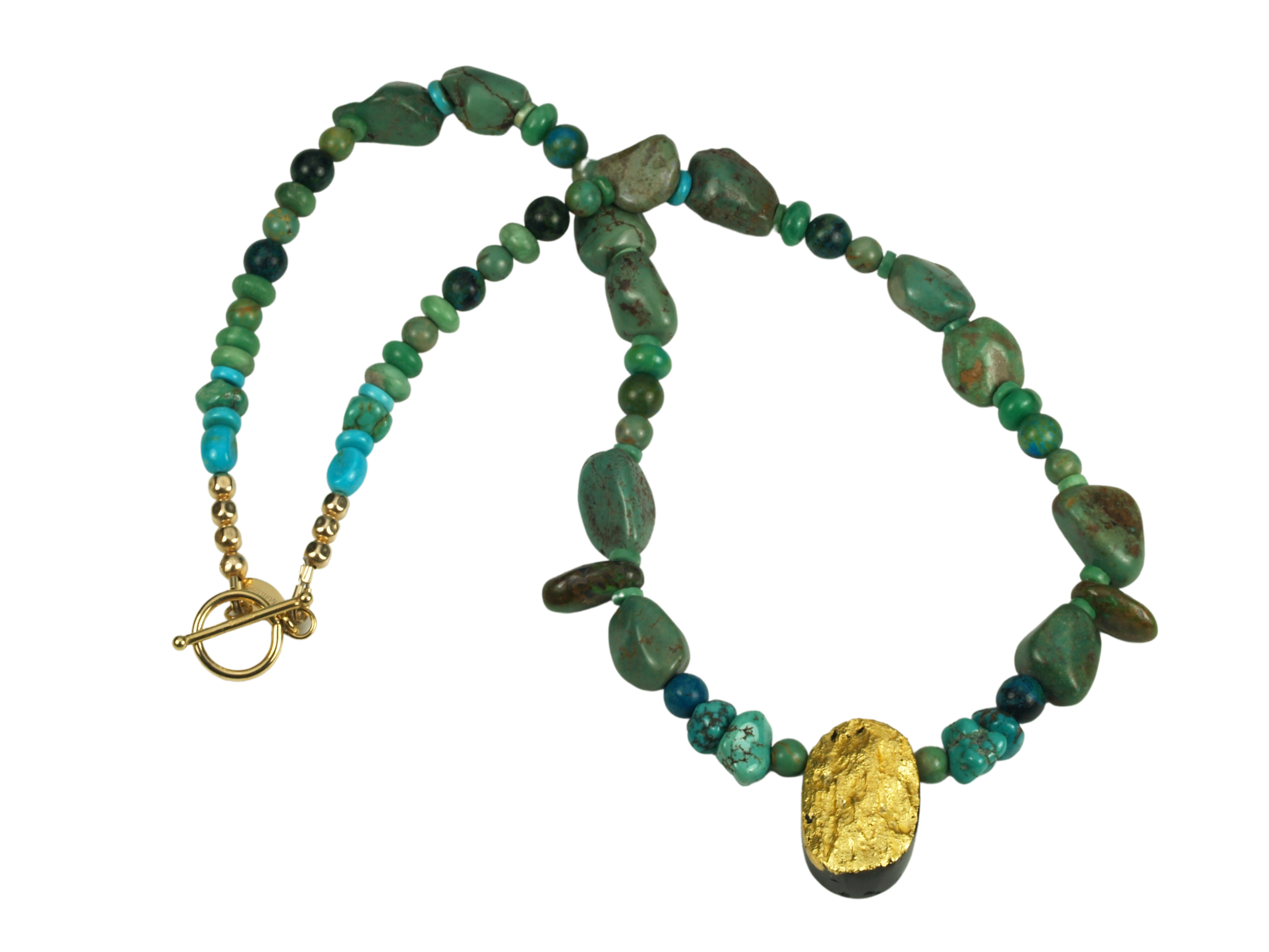 A green and gold necklace with a gold toggle clasp, featuring hand-gilded tektite stone and accompanied by green turquoise and azurite/malachite stones.