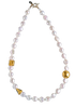 "Fantasy Glow" Necklace with  10 and 11mm AAA white freshwater coin pearls, 4mm moonstone beads in-between each pearl. Off set with whimsy and elegance are thee lamp work  gold Venetian  beads. The necklace is finished with 14 Karat gold-filled toggle clasp and artist signature tag. The necklace measures 21.5".