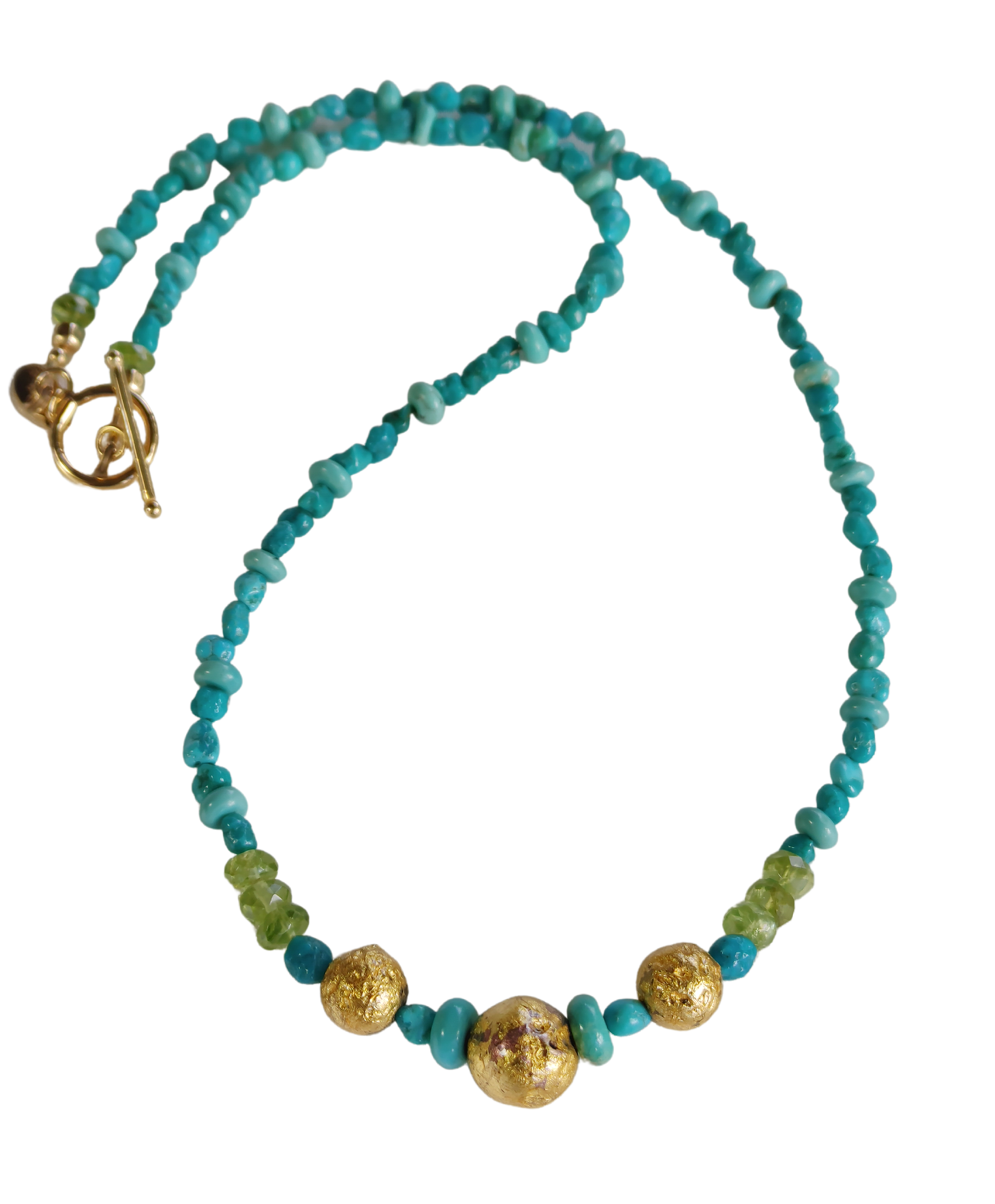 necklace with 24-Karat gold leaf on three round lava stones for centerpiece surrounded by turquoise beads, faceted peridot beads, and 14-Karat gold-filled Toggle Clasp along with designer signature tag