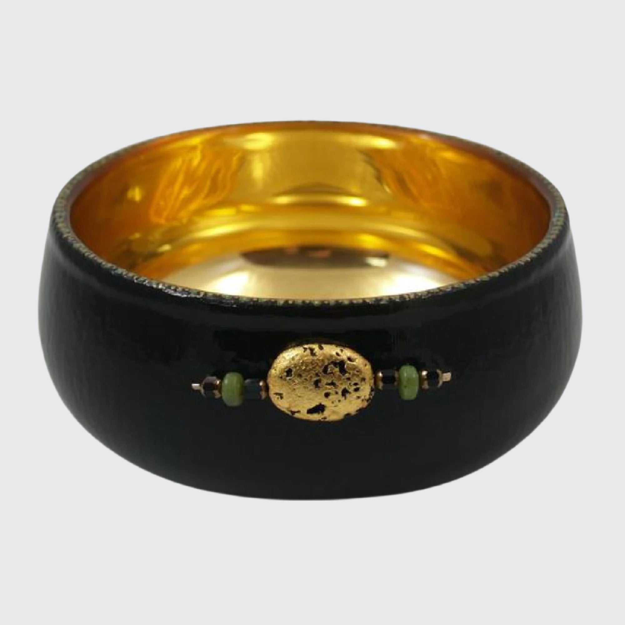 decor gold gilded and black painted glass bowl with gilded lava stone and jade on the front of bowl