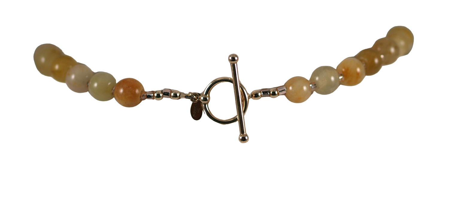 yellow jade and gold necklace with gold toggle clasp