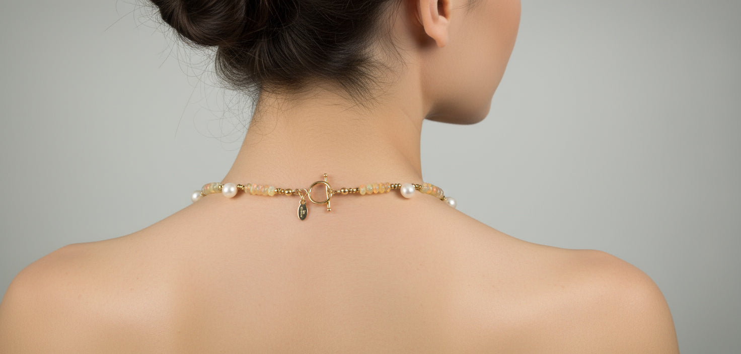 Back of necklace showing toggle clasp on a model.