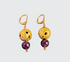 Amethyst Nugget Glow Earrings  - Amethyst, 23-Karat Gold Leaf On Stone  Hand-gilded lava stone with 23-karat gold leaf, smooth amethyst beads, and 14-karat gold-filled lever back findings.  The dangle drop equals = 1.5" (3.81cm)