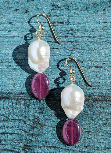 Baroque Pearl and Ruby dangle earrings with 14 karat gold earring wire.