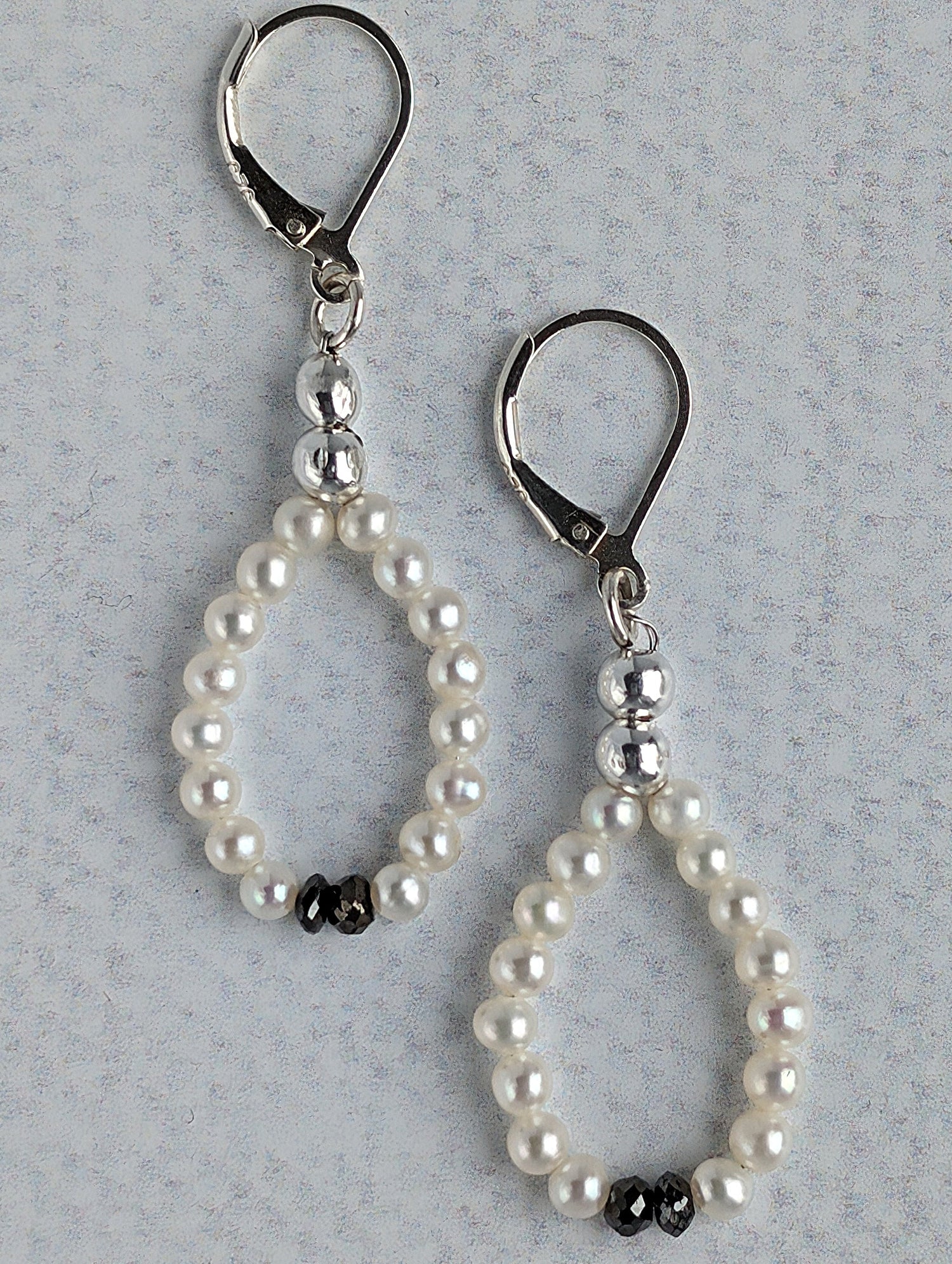 Champagne and Caviar Earrings - White Pearls and Black Diamonds