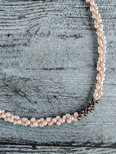 Champagne and Caviar Black Diamond and Pearl Necklace -  The combination of black diamonds and white pearls creates a striking contrast. The use of the Japanese Kumihimo technique to braid the beads on eight strands demonstrates the attention to detail and craftsmanship involved in creating this piece. The necklace measures 18" 