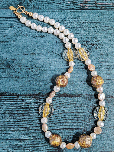 Pearl necklace with gold gilded beads, Czech glass beads, gold toggle clasp with artist signature tag.