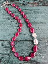 Load image into Gallery viewer, Ruby and Baroque Pearl Necklace - &quot;Romancing the Ruby&quot; necklace. This exquisite piece features cabochon smooth rubies, lustrous Baroque pearls, sterling silver beads, a charming toggle clasp, and a signature tag by the artist. With a length of 18 inches.