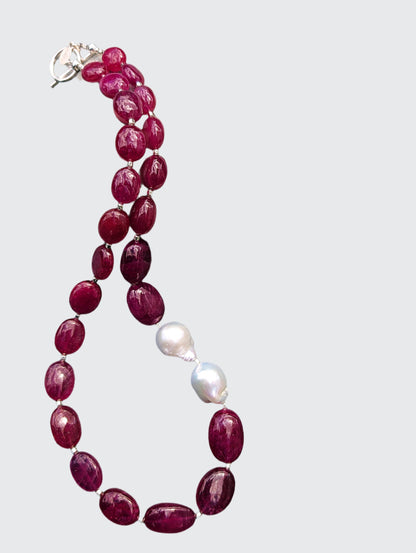 Ruby and Baroque Pearl Necklace - &quot;Romancing the Ruby&quot; necklace. This exquisite piece features cabochon smooth rubies, lustrous Baroque pearls, sterling silver beads, a charming toggle clasp, and a signature tag by the artist. With a length of 18 inches.