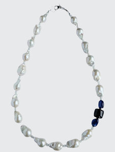 Baroque Pearl, moonstone, and Sapphire necklace with a sterling silver heart clasp.