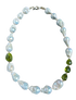 Necklace with white and green pearls on a white background