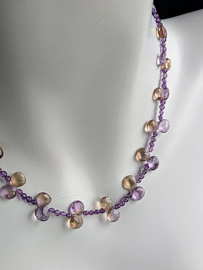 Necklace with multicolored beads on a white background