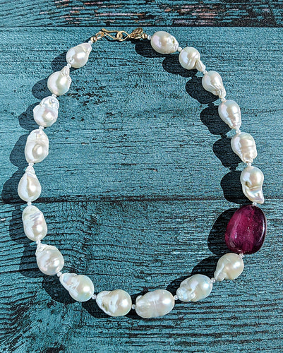 White Baroque Pearl and Ruby Necklace with 14 Karat Gold hook and eye clasp.