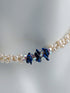 "Something Blue" necklace is a combination of glowing cultured freshwater pearls with center stones in gorgeous lapis lazuli and sparkly Swarovski crystals. The beads are braided on 8 strands to create an elegant heirloom-quality necklace 