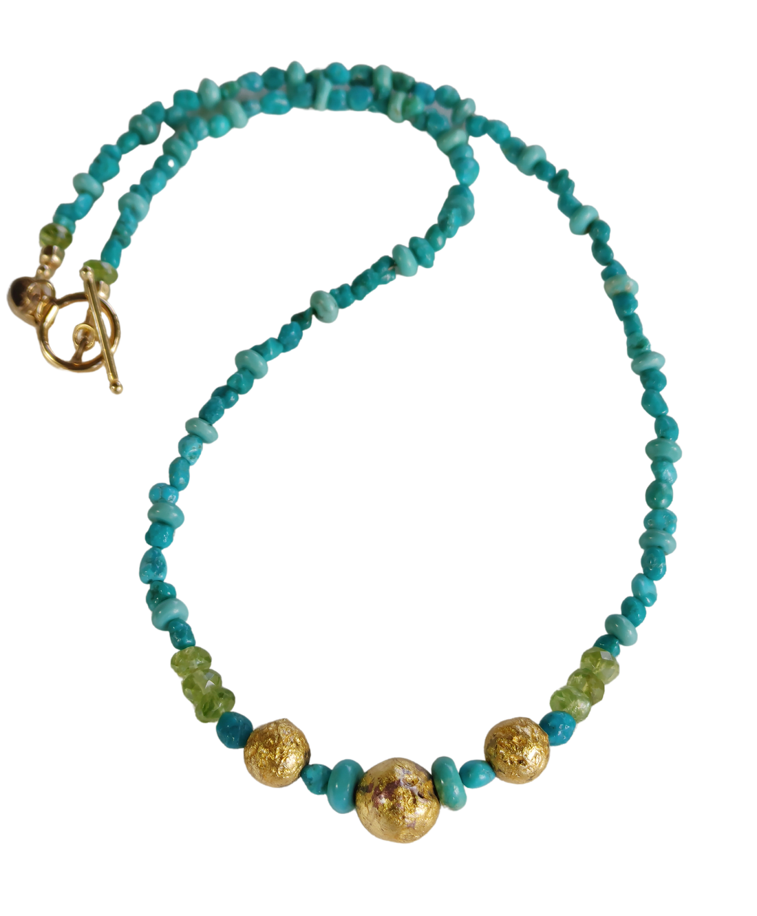 necklace with 24-Karat gold leaf on three round lava stones for centerpiece surrounded by turquoise beads, faceted peridot beads, and 14-Karat gold-filled Toggle Clasp along with designer signature tag