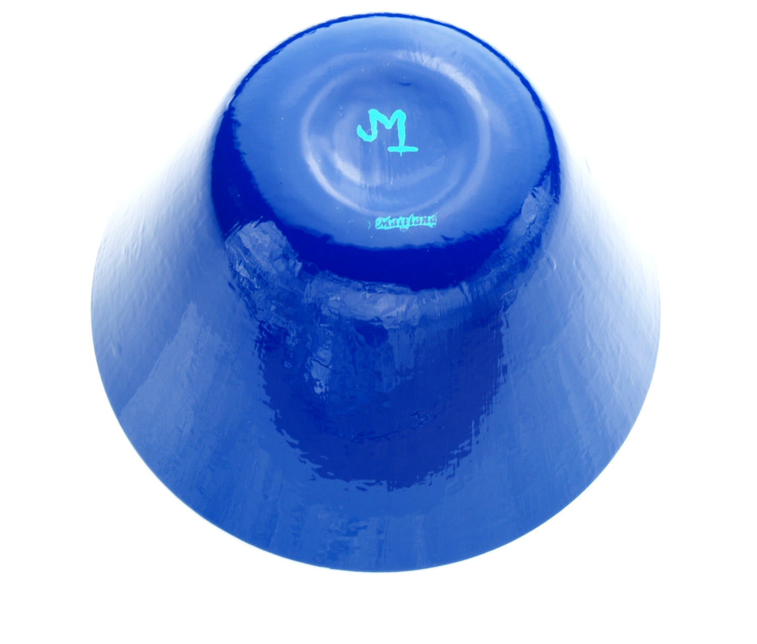 Bottom of blue glass bowl showing signature