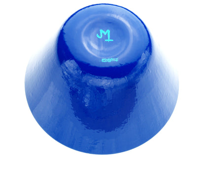 Bottom of blue glass bowl showing signature