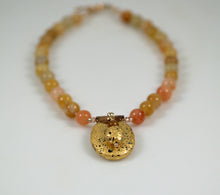 Load image into Gallery viewer, gold gilded on lava pendant and yellow jade necklace