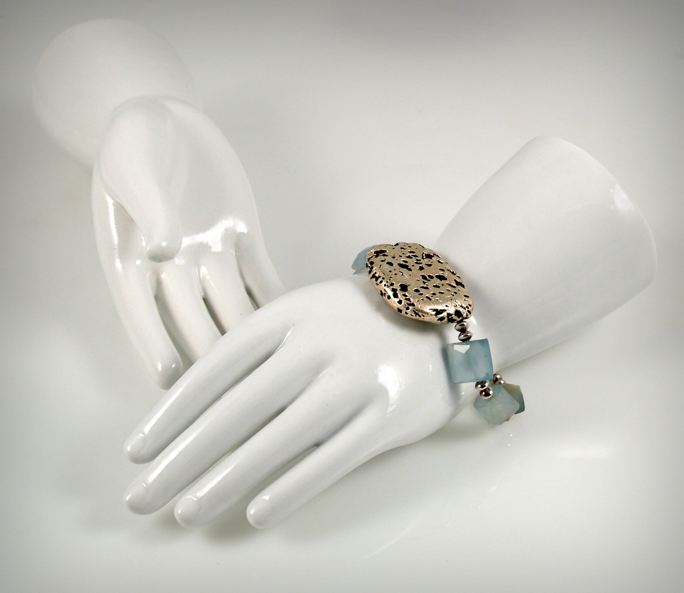 Baby Blue Glow Bracelet in Chalcedony and White Gold Gilded Leaf On Lava Stone